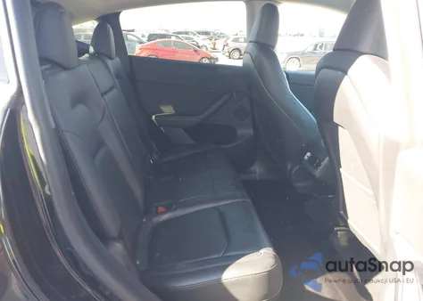 2023 Tesla Model Y Awd/Long Range Dual Motor All-Wheel Drive z USA, uszkodzony, nr VIN 7SAYGDEE3PA028171